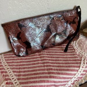 Express leather floral embossed clutch/wristlet